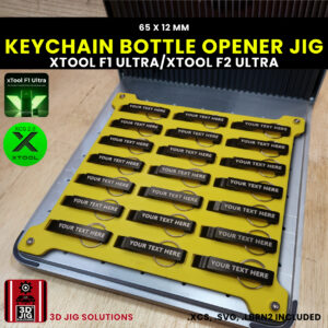 A top-down view of the xTool F1 Ultra Keychain Bottle Opener Jig loaded with 21 blank aluminum keychain bottle openers.