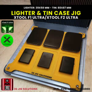 xTool F1 Ultra laser jig securely holding a Zippo-style lighter and its tin case with an xTool F1 Ultra laser nearby.