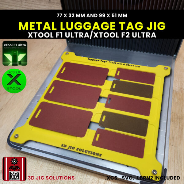 A top-down view of the xTool F1 Ultra Luggage Tag Jig loaded with both large and small blank anodized aluminum luggage tags.