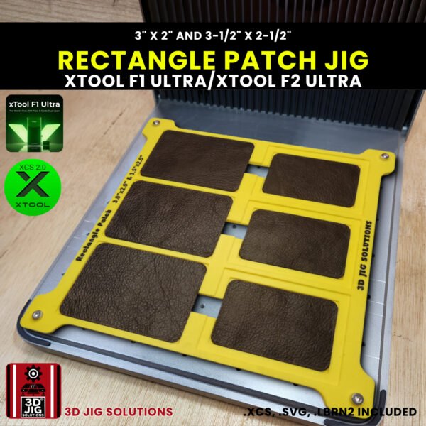 A top-down view of the xTool F1 Ultra Rectangle Patch Jig loaded with both 3" x 2" and 3.5" x 2.5" leatherette patches.