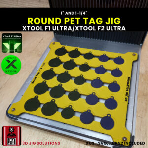 A top-down view of the xTool F1 Ultra Round Pet Tag Jig loaded with blank 1" and 1-1/4" aluminum pet ID tags.