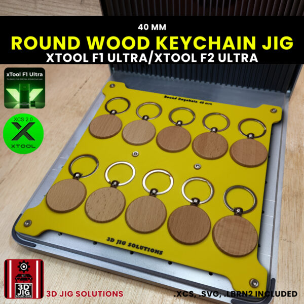 A top-down view of the xTool F1 Ultra Wood Keychain Jig holding 10 blank 40mm round bamboo keychains.