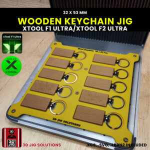 A top-down view of the xTool F1 Ultra Bamboo Keychain Jig loaded with 10 blank rectangular bamboo keychains