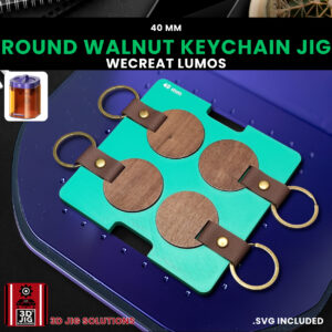 A top-down view of the WeCreat Lumos keychain jig holding four 40mm round walnut keychains.