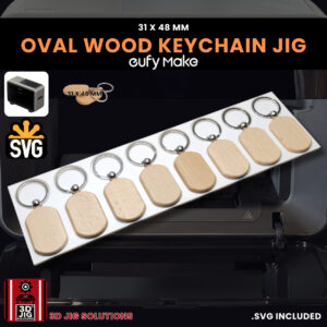 A top-down view of the EufyMake E1 oval wood keychain jig holding multiple blank keychains.
