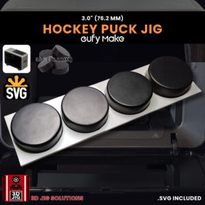A top-down view of the EufyMake E1 hockey puck jig holding multiple blank pucks.