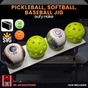 A top-down view of the EufyMake E1 baseball UV printer jig holding a baseball, softball, and pickleball.