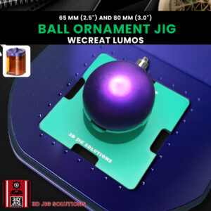 A top-down view of the WeCreat Lumos ball ornament jig holding both a 65mm and 80mm Christmas ornament.