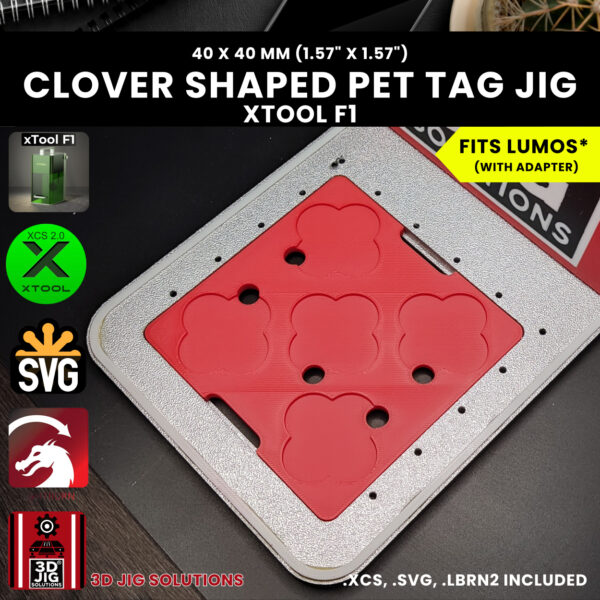 A close-up shot of the laser engraving jig with a laser-engraved clover pet tag, showing the detailed and perfectly centered design.