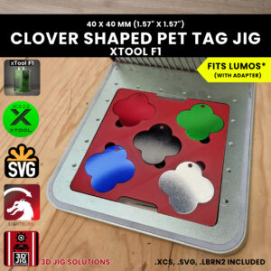A top-down view of the xTool F1 Clover Pet Tag Laser Engraving Jig holding five blank clover-shaped metal tags.