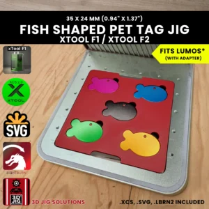 A top-down view of the xTool F1 & F2 Fish Pet Tag Laser Engraving Jig holding eight blank fish-shaped metal tags.